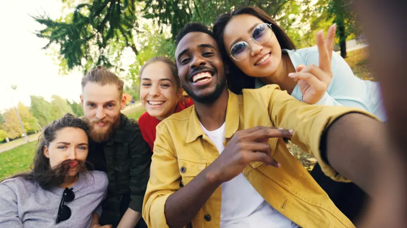A group of friends taking a selfie outdoors